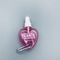 Prodotto disinfettante della mano della bottiglia dell'ANIMALE DOMESTICO di Mini Heart Leaf Shape Cosmetic con la catena chiave